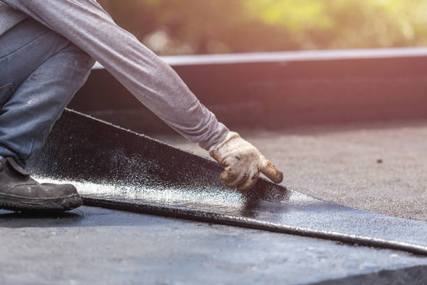 Professional Waterproofing technician working in Maize, KS